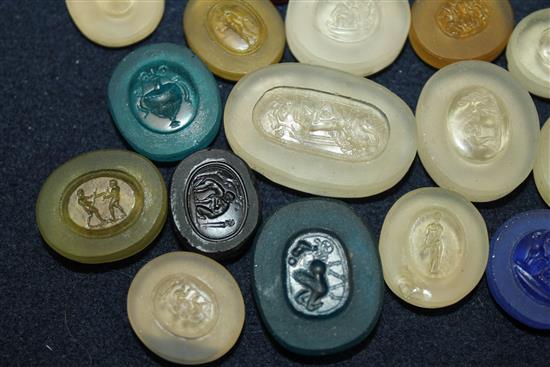 A collection of thirty seven various unmounted hardstone and glass Grand Tour intaglios, largest 1.5in.